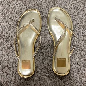 Gold Dolce Vita flip flop sandals